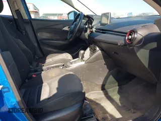 2016 Mazda CX-3 Sport z VIN JM1DKFB73G0140286, wystawiony jako IAAI lot #42235327 z przebiegiem 83 430 mil mil oraz . Historia ofert i sprzedaży dostępna na DreamBid. Obrazek 5.