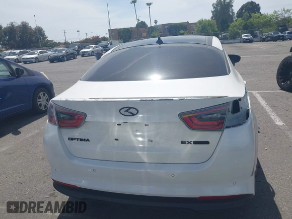 2016 Kia Optima EX z VIN KNAGN4ADXG5098506, wystawiony jako IAAI lot #42213999 z przebiegiem 126 220 mil mil oraz . Historia ofert i sprzedaży dostępna na DreamBid. Obrazek 16.