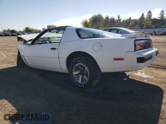 1988 Pontiac Firebird z VIN 1G2FS21S4JL245615, wystawiony jako Copart lot #73486314 z przebiegiem 144 774 mil mil oraz Czysty tytuł • Clean title. Historia ofert i sprzedaży dostępna na DreamBid. Obrazek 2.