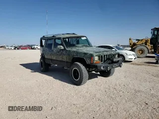 1999 Jeep Cherokee Sport with VIN 1J4FF68S6XL645028, listed as a Copart auction lot 48897255 with 218,552 mi miles and Salvage Title. Bid and sale history available at carsss.com. Image 10.
