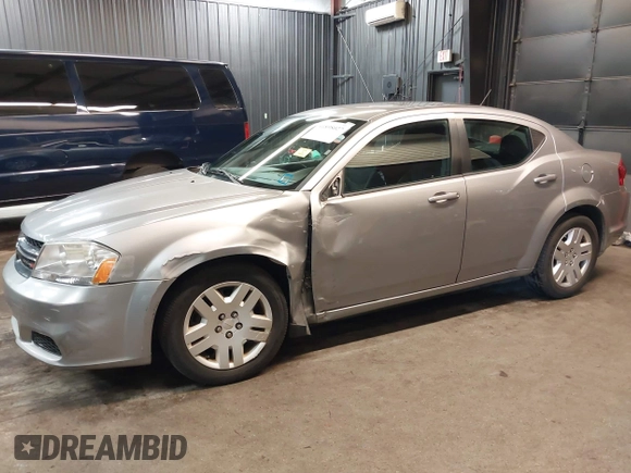 2014 Dodge Avenger SE with VIN 1C3CDZAB5EN228953, listed as a IAAI auction lot 41898027 with 33,731 mi miles. Bid and sale history available at carsss.com. Image 6.