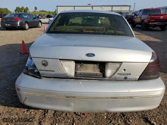 2000 Ford Crown Victoria with VIN 2FAFP73W5YX181565, listed as a Copart auction lot 77098594 with 180,439 mi miles and Salvage Title. Bid and sale history available at carsss.com. Image 6.