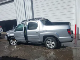 2014 Honda Ridgeline RTL with VIN 5FPYK1F51EB012843, listed as a IAAI auction lot 41629002 with 114,761 mi miles. Bid and sale history available at carsss.com. Image 14.