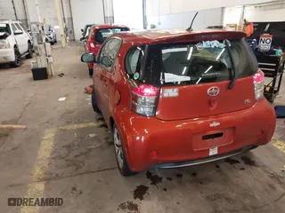 2012 Scion iQ with VIN JTNJJXB0XCJ019799, listed as a IAAI auction lot 41244212 with 1 mi miles. Bid and sale history available at carsss.com. Image 3.