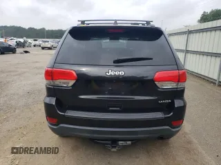 2016 Jeep Grand Cherokee Laredo with VIN 1C4RJEAG4GC394091, listed as a Copart auction lot 56595165 with 134,135 mi miles and Salvage title. Bid and sale history available at DreamBid. Image 6.