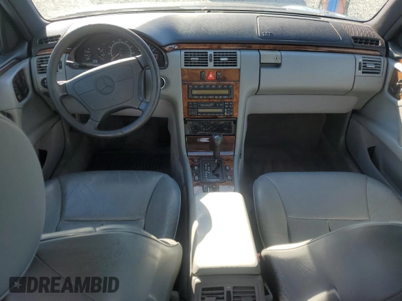 1998 Mercedes-Benz E-Class with VIN WDBJF65F3WA642006, listed as a Copart auction lot 87309994 with 129,837 mi miles and Salvage Title. Bid and sale history available at carsss.com. Image 8.