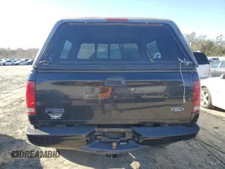 2002 Ford F-150 XL with VIN 1FTRF18232NA58109, listed as a Copart auction lot 79080674 with 148,213 mi miles and Salvage title. Bid and sale history available at DreamBid. Image 6.