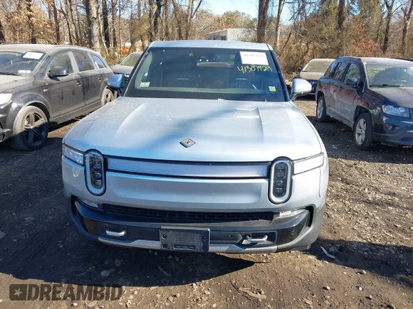 2022 Rivian R1T Adventure Package with VIN 7FCTGAAA1NN012328, listed as a IAAI auction lot 41307929 with 13,588 mi miles. Bid and sale history available at carsss.com. Image 12.