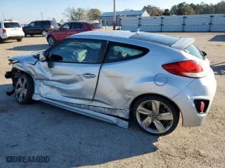 2013 Hyundai Veloster Turbo w/Black Int with VIN KMHTC6AE5DU160709, listed as a Copart auction lot 41667965 with 140,961 mi miles and Salvage Title. Bid and sale history available at carsss.com. Image 2.
