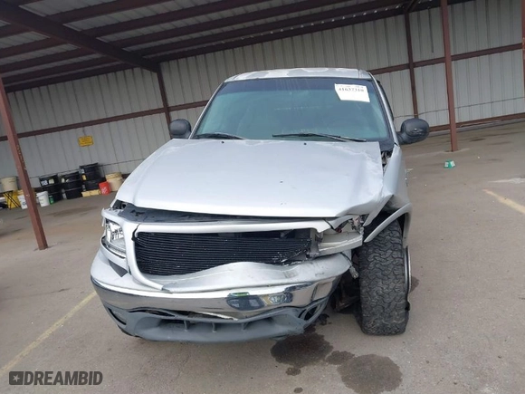2000 Ford F-150 XL with VIN 1FTRX18L9YKA05396, listed as a IAAI auction lot 41637310 with 234,555 mi miles. Bid and sale history available at carsss.com. Image 12.