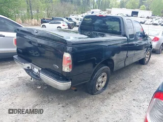 2000 Ford F-150 XL with VIN 1FTZX1723YNB84512, listed as a IAAI auction lot 41966003 with 1 mi miles. Bid and sale history available at carsss.com. Image 4.