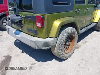 2008 Jeep Wrangler Unlimited Sahara with VIN 1J4GA59128L608191, listed as a IAAI auction lot 42669266 with 201,156 mi miles and . Bid and sale history available at DreamBid. Image 6.