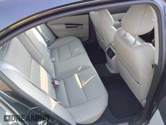 2016 Acura TLX with VIN 19UUB1F37GA009304, listed as a IAAI auction lot 41558307 with 39,567 mi miles. Bid and sale history available at carsss.com. Image 8.
