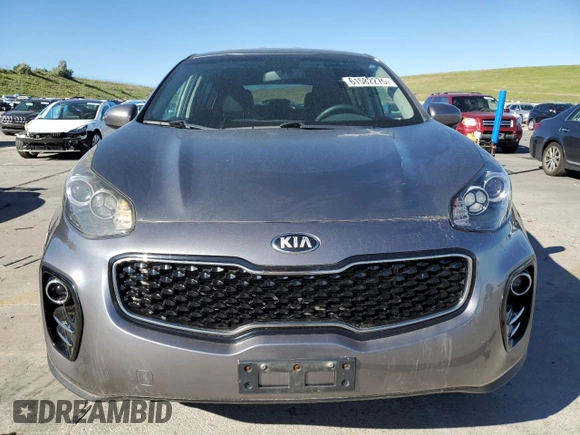 2018 Kia Sportage LX z VIN KNDPMCAC8J7330264, wystawiony jako Copart lot #61582275 z przebiegiem 93 201 mil mil oraz Czysty tytuł • Clean title. Historia ofert i sprzedaży dostępna na DreamBid. Obrazek 5.