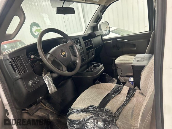 2017 Chevrolet Express Cargo Van with VIN 1GCWGAFFXH1244087, listed as a IAAI auction lot 42146943 with 183,282 mi miles. Bid and sale history available at carsss.com. Image 1.