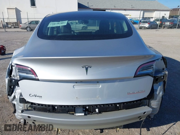 2018 Tesla Model 3 Long Range Battery with VIN 5YJ3E1EB9JF065057, listed as a IAAI auction lot 41863903 with 54,584 mi miles and . Bid and sale history available at DreamBid. Image 16.