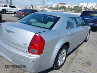 2007 Chrysler 300 Touring with VIN 2C3KA53G57H737815, listed as a IAAI auction lot 42126668 with 46,750 mi miles and . Bid and sale history available at DreamBid. Image 6.