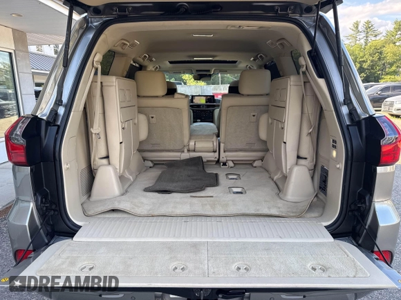 2016 Lexus LX 570 with VIN JTJHY7AX4G4198811, listed as a IAAI auction lot 42702619 with 107,759 mi miles and . Bid and sale history available at DreamBid. Image 6.