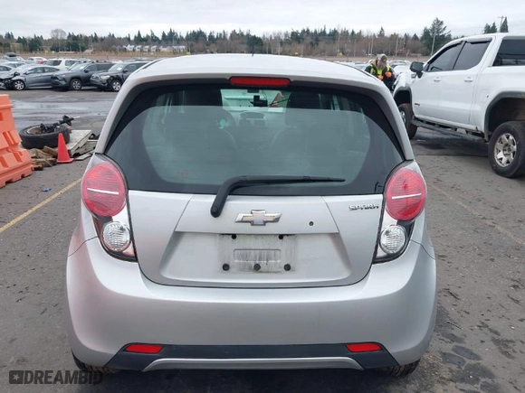 2014 Chevrolet Spark LT with VIN KL8CD6S95EC458499, listed as a IAAI auction lot 41614652 with 133,628 mi miles. Bid and sale history available at carsss.com. Image 16.