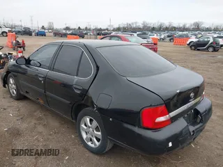 2000 Nissan Altima XE with VIN 1N4DL01D9YC104061, listed as a IAAI auction lot 41970227 with 176,515 mi miles and . Bid and sale history available at carsss.com. Image 3.