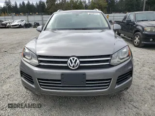 2012 Volkswagen Touareg Sport with VIN WVGFK9BP4CD001860, listed as a Copart auction lot 55090375 with 153,456 mi miles and Salvage title. Bid and sale history available at DreamBid. Image 5.