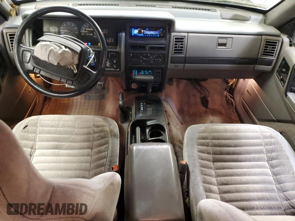 1993 Jeep Grand Cherokee Laredo with VIN 1J4GZ58SXPC554642, listed as a Copart auction lot 83268254 with 266,063 mi miles and Salvage Title. Bid and sale history available at carsss.com. Image 8.