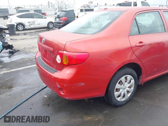 2009 Toyota Corolla with VIN JTDBL40E099075020, listed as a IAAI auction lot 41736322 with 211,111 mi miles. Bid and sale history available at carsss.com. Image 6.