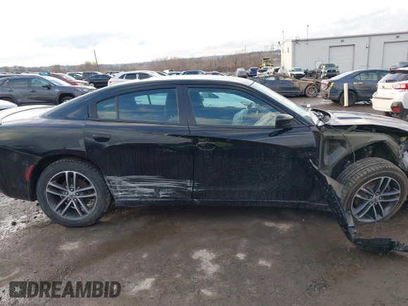 2019 Dodge Charger SXT with VIN 2C3CDXJG3KH630975, listed as a IAAI auction lot 41580174 with 74,575 mi miles and . Bid and sale history available at DreamBid. Image 13.