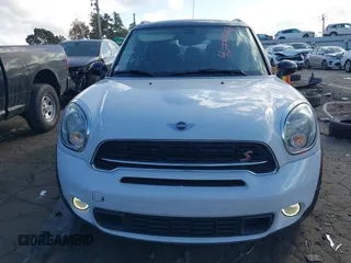 2015 MINI Countryman S with VIN WMWZC3C5XFWT06360, listed as a IAAI auction lot 40774863 with 127,383 mi miles and . Bid and sale history available at DreamBid. Image 12.