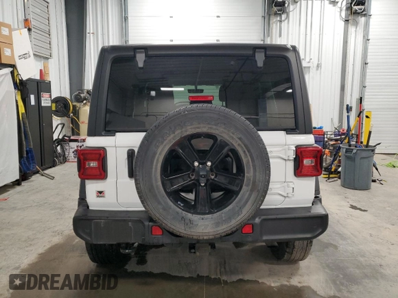 2023 Jeep Wrangler Sport S with VIN 1C4HJXDN1PW628218, listed as a Copart auction lot 48355205 with 32,009 mi miles and Salvage title. Bid and sale history available at DreamBid. Image 6.