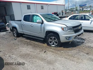 2015 Chevrolet Colorado 4WD Z71 with VIN 1GCGTCE33F1194990, listed as a IAAI auction lot 42521460 with 144,297 mi miles and . Bid and sale history available at DreamBid. Image 1.