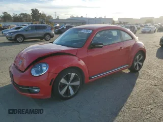2012 Volkswagen Beetle 2.0T Black Turbo Launch Edition PZEV with VIN 3VWVA7AT8CM655414, listed as a Copart auction lot 47628025 with 94,105 mi miles and Salvage Title. Bid and sale history available at carsss.com. Image 1.