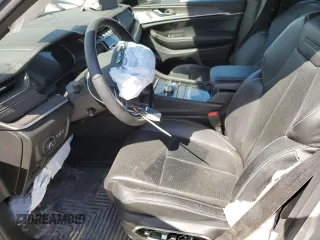 2022 Jeep Grand Cherokee Overland with VIN 1C4RJKDG0N8561055, listed as a Copart auction lot 53207195 with 23,504 mi miles and Salvage title. Bid and sale history available at DreamBid. Image 7.