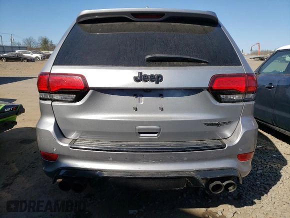 2018 Jeep Grand Cherokee with VIN NJ1454E, listed as a Copart auction lot 48051693 with 66,894 mi miles and Salvage title. Bid and sale history available at DreamBid. Image 6.