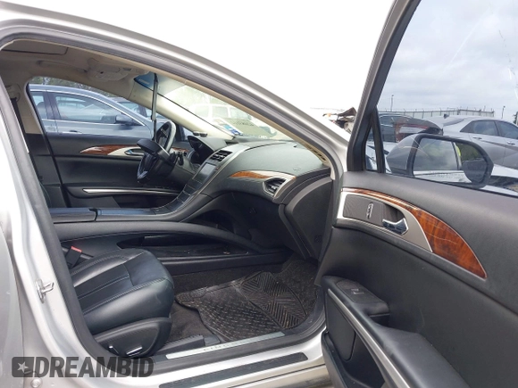 2015 Lincoln MKZ with VIN 3LN6L2G90FR616254, listed as a IAAI auction lot 42083112 with 191,803 mi miles. Bid and sale history available at carsss.com. Image 5.