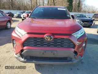 2019 Toyota RAV4 XLE with VIN JTMP1RFV2KD039171, listed as a Copart auction lot 82153374 with 64,482 mi miles and Salvage Title. Bid and sale history available at carsss.com. Image 5.