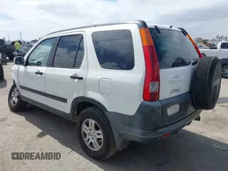 2002 Honda CR-V EX with VIN JHLRD78852C095223, listed as a IAAI auction lot 41812856 with 234,219 mi miles and . Bid and sale history available at DreamBid. Image 3.