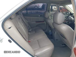 2003 Toyota Camry LE with VIN JTDBE32K530180834, listed as a IAAI auction lot 42255688 with 134,594 mi miles and . Bid and sale history available at DreamBid. Image 8.