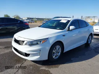 2018 Kia Optima LX with VIN 5XXGT4L32JG181735, listed as a IAAI auction lot 41699217 with 74,822 mi miles. Bid and sale history available at carsss.com. Image 2.