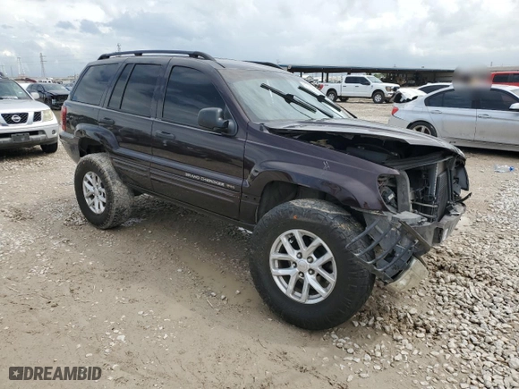 2004 Jeep Grand Cherokee Laredo with VIN 1J4GX48S44C150571, listed as a Copart auction lot 51013675 with 260,986 mi miles and Salvage Title. Bid and sale history available at carsss.com. Image 4.