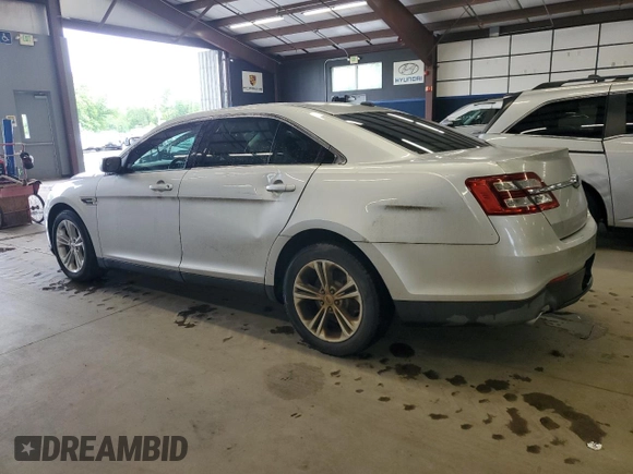 2014 Ford Taurus SEL z VIN 1FAHP2E86EG128370, wystawiony jako Copart lot #58216645 z przebiegiem 95 488 mil mil oraz Czysty tytuł • Clean title. Historia ofert i sprzedaży dostępna na DreamBid. Obrazek 2.