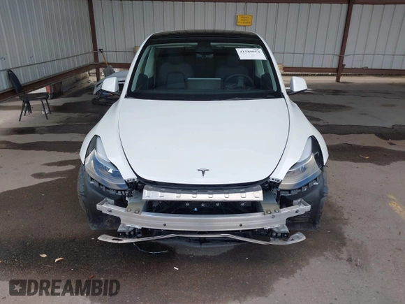 2023 Tesla Model Y Long Range with VIN 7SAYGAEE0PF787216, listed as a IAAI auction lot 41589954 with 17,985 mi miles and . Bid and sale history available at DreamBid. Image 13.