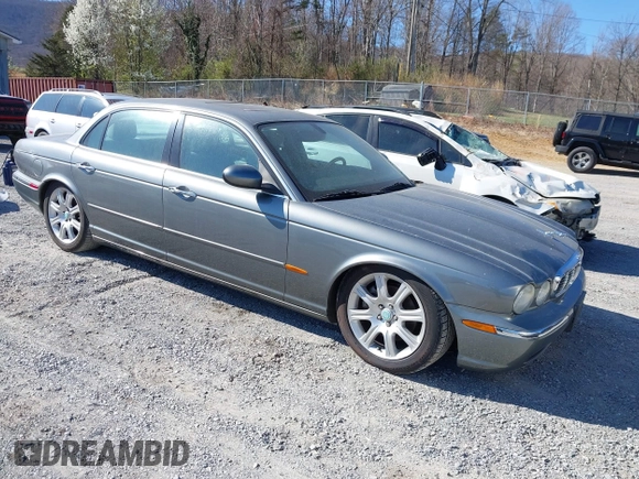 2005 Jaguar XJ with VIN SAJWA79C85SG48974, listed as a IAAI auction lot 41844684 with 154,145 mi miles. Bid and sale history available at carsss.com. Image 1.