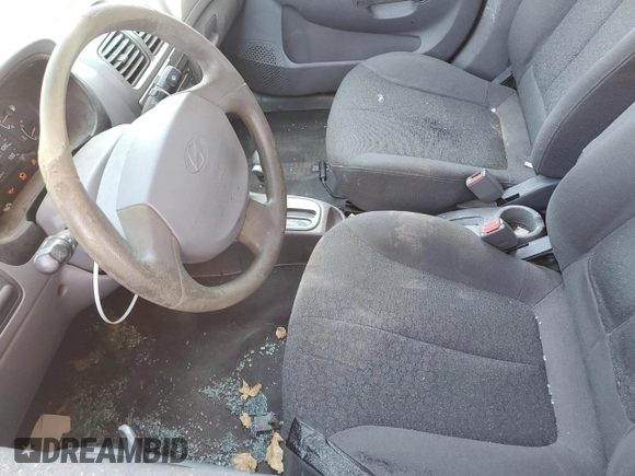 2002 Hyundai Accent GL with VIN KMHCG45C32U332833, listed as a Copart auction lot 66539644 with 69,763 mi miles and Salvage Title. Bid and sale history available at carsss.com. Image 7.