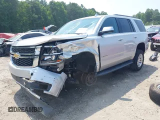 2019 Chevrolet Tahoe LT with VIN 1GNSKBKC8KR363433, listed as a IAAI auction lot 42567045 with 122,956 mi miles and . Bid and sale history available at DreamBid. Image 2.