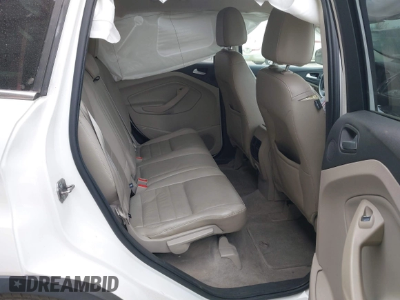 2013 Ford Escape SEL with VIN 1FMCU0H99DUB83641, listed as a IAAI auction lot 41578882 with 124,872 mi miles. Bid and sale history available at carsss.com. Image 8.