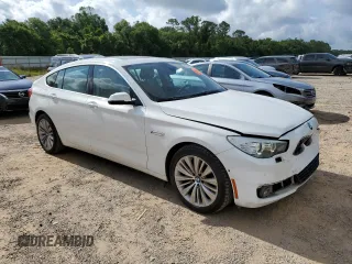 2015 BMW 5 Series 535i Gran Turismo with VIN WBA5M2C58FGH99149, listed as a Copart auction lot 57163285 with 124,610 mi miles and Salvage title. Bid and sale history available at DreamBid. Image 4.