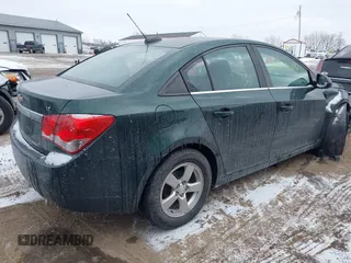 2015 Chevrolet Cruze LT with VIN 1G1PC5SB5F7217036, listed as a IAAI auction lot 41618670 with 141,615 mi miles and . Bid and sale history available at DreamBid. Image 4.