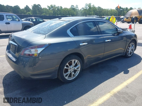 2013 Nissan Maxima SV with VIN 1N4AA5AP5DC815847, listed as a IAAI auction lot 42758399 with 168,056 mi miles and . Bid and sale history available at DreamBid. Image 4.