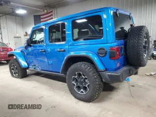 2022 Jeep Wrangler Unlimited Rubicon with VIN 1C4JJXR69NW190564, listed as a Copart auction lot 83703504 with 16,803 mi miles and Salvage title. Bid and sale history available at DreamBid. Image 2.